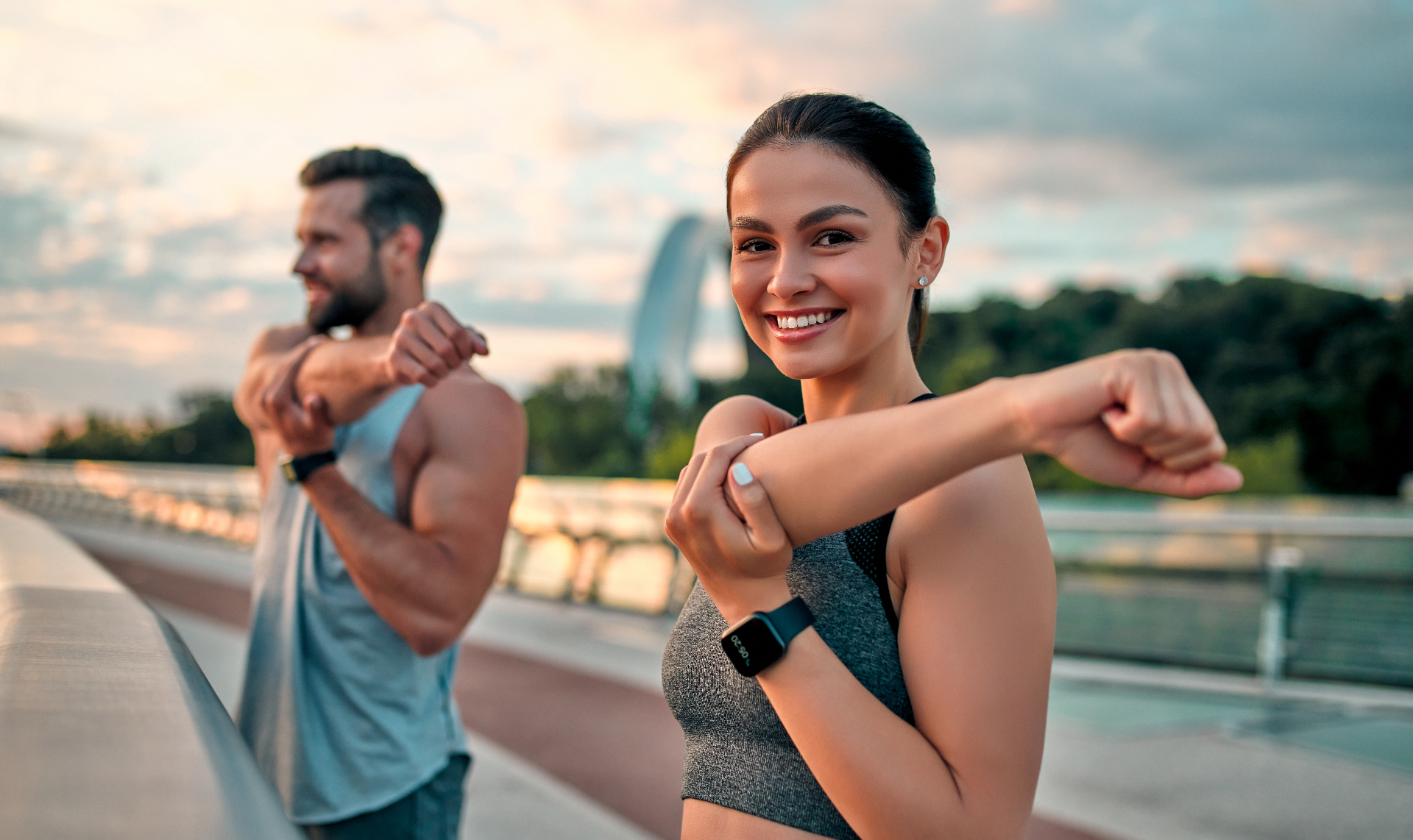 Couple stretching outdoors